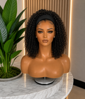 Kinky curly headband wig in 100% virgin human hair, natural 1B with 150% density, from Nikki Smith Hair Collection