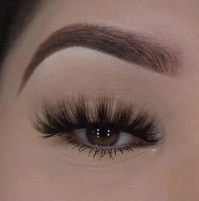 Claire 3D faux mink lashes with voluminous layered volume for a dramatic flutter, from Nikki Smith Hair Collection