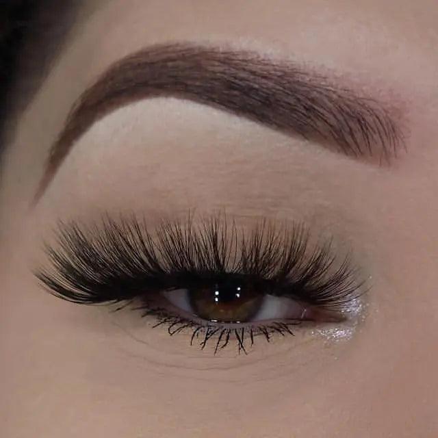 Ella 3D faux mink lashes with voluminous layered volume for a dramatic flutter, from Nikki Smith Hair Collection