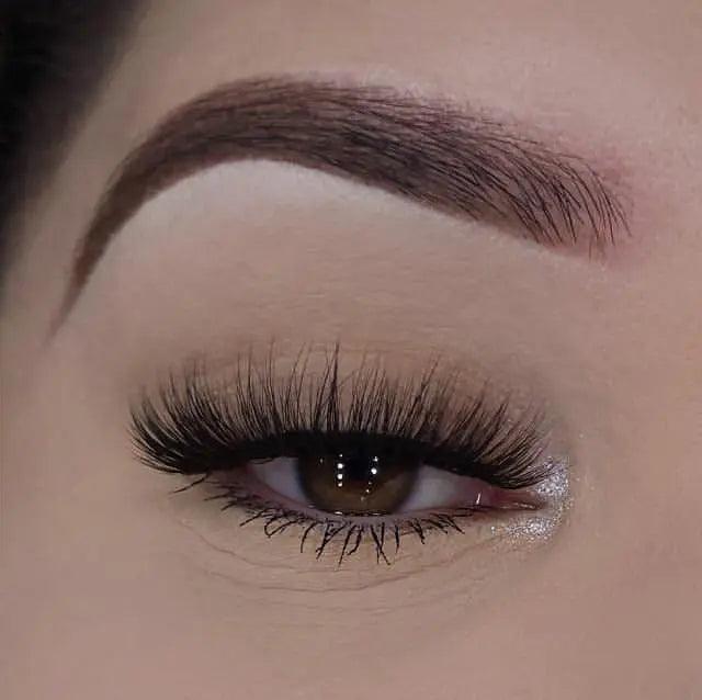 Grace 3D faux mink lashes with voluminous layered volume for a dramatic flutter, from Nikki Smith Hair Collection