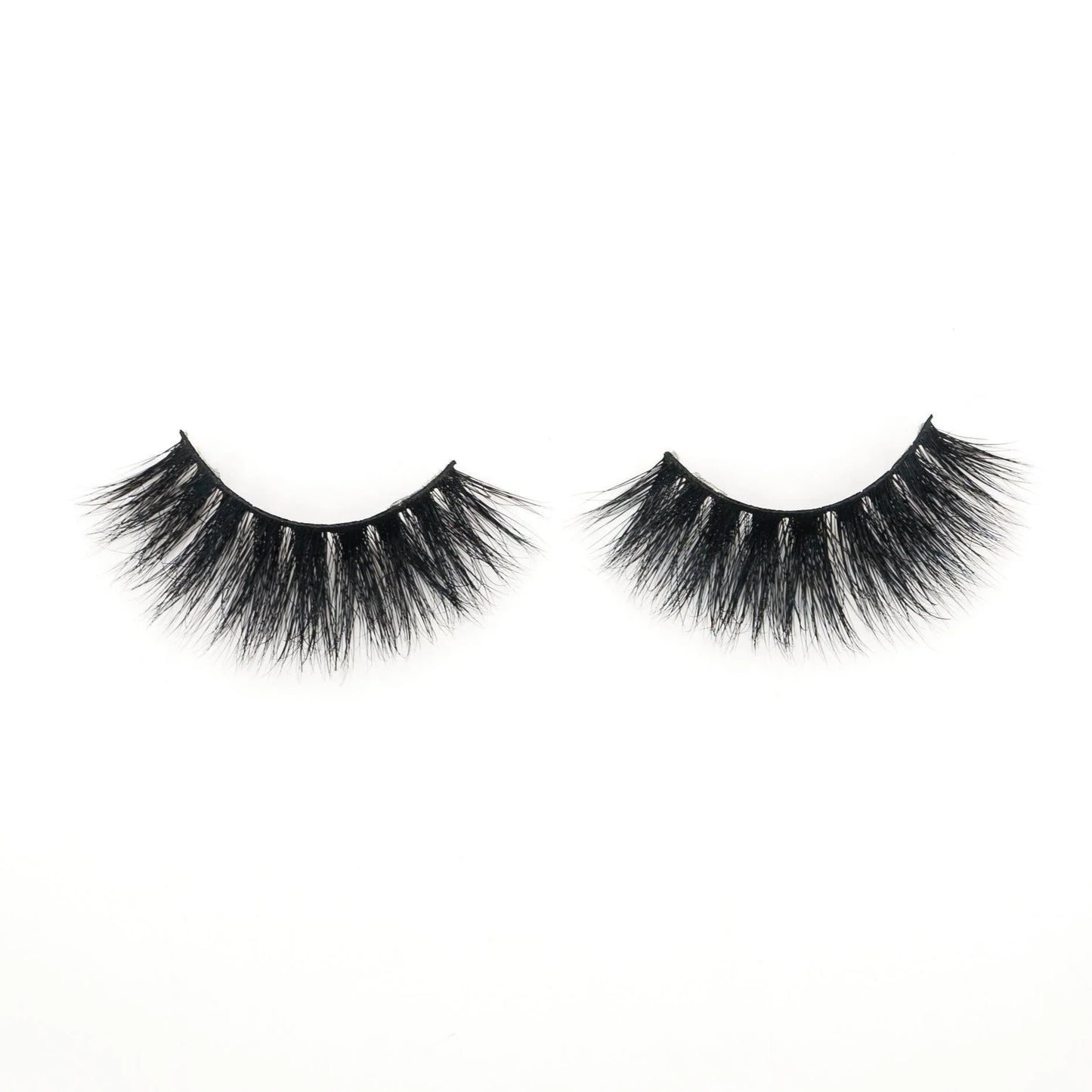 3D lashes from Nikki Smith Hair Collection, offering voluminous, fluttery lashes with a natural, layered look for a dramatic yet elegant eye enhancement.