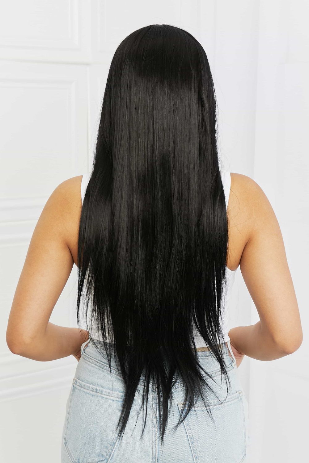 Close-up view of the lace front synthetic wig, showcasing its realistic hairline and sleek straight texture