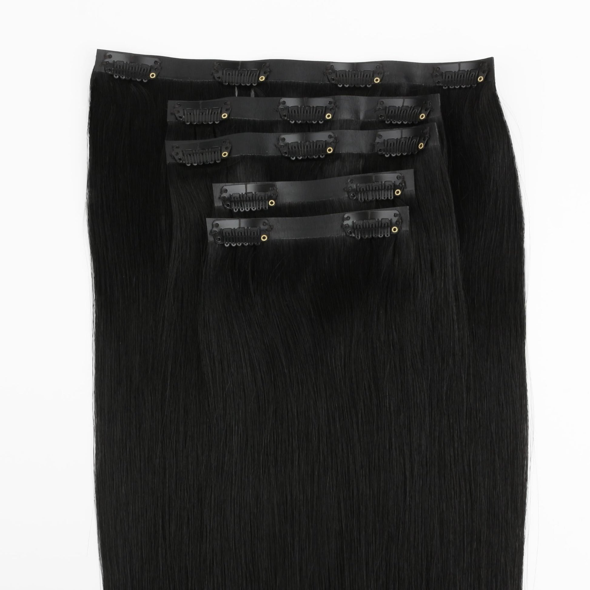 Jet Black seamless clip-in hair extensions in 100% human hair – Nikki Smith Hair Collection