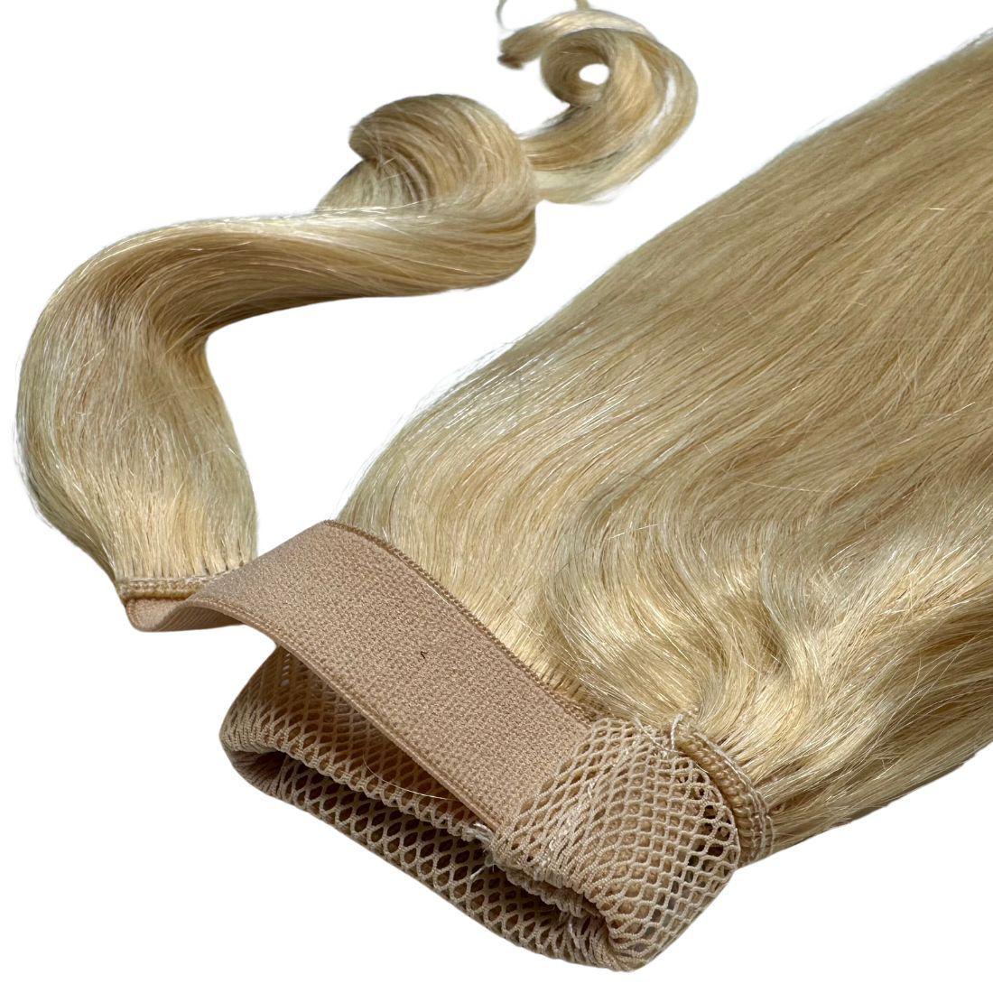 Close-up view of Bleach Blonde Ponytail extension showcasing the elegant blonde color and length.