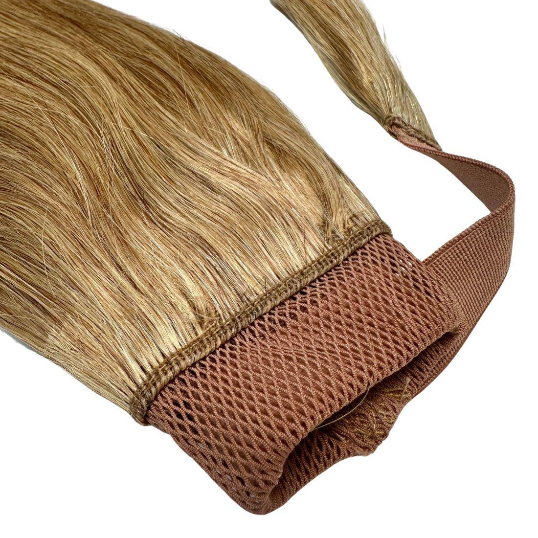 Close-up of Auburn Ponytail, highlighting the secure comb attachment and easy-to-use design.