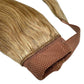 Close-up of Auburn Ponytail, highlighting the secure comb attachment and easy-to-use design.
