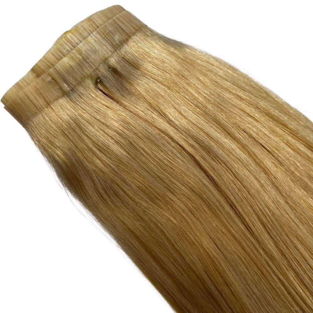 Auburn Seamless Clip-In set from Nikki Smith Hair Collection, highlighting the variety of wefts for a customizable, voluminous hairstyle.