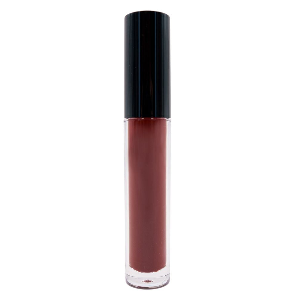 Close-up of Nikki Smith Hair Collection hair serum bottle, showcasing sleek packaging.
