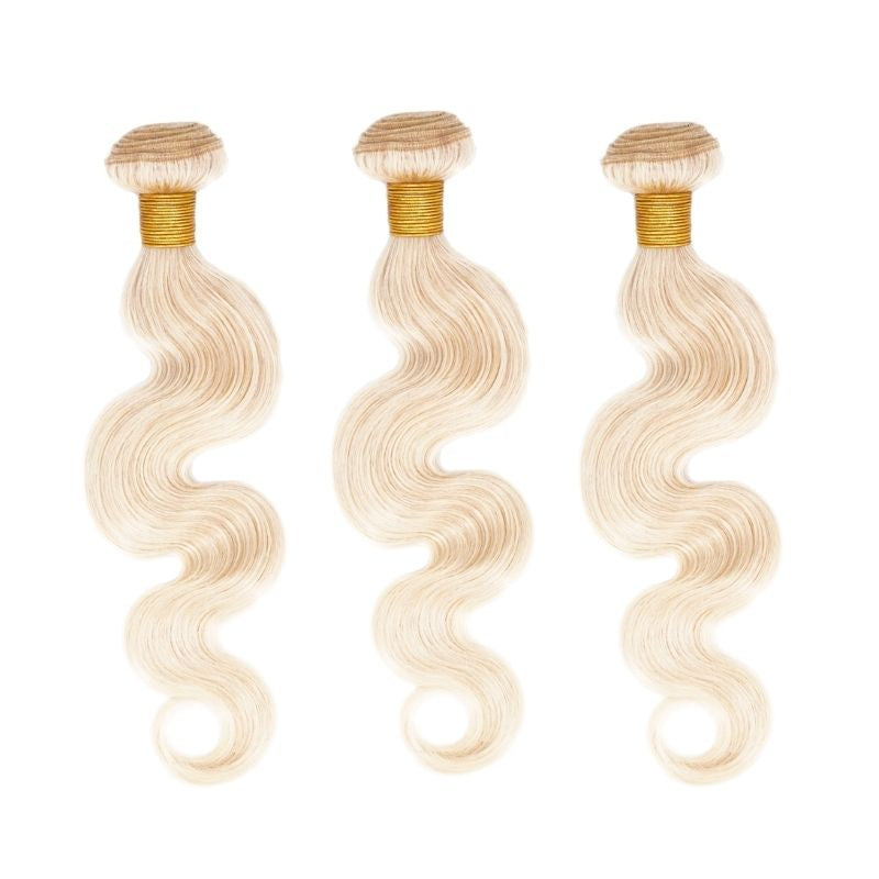 Russian Blonde BodyWave Bundle Deals from Nikki Smith Hair Collection. 100% human hair with machine double stitch wefts, available in lengths from 12” to 26”. Soft, smooth, and luxurious texture with natural sheen, offering three bundles per deal. Weight per bundle: 100 grams / 3.5 oz, with a total weight of 300 grams / 10.5 oz.