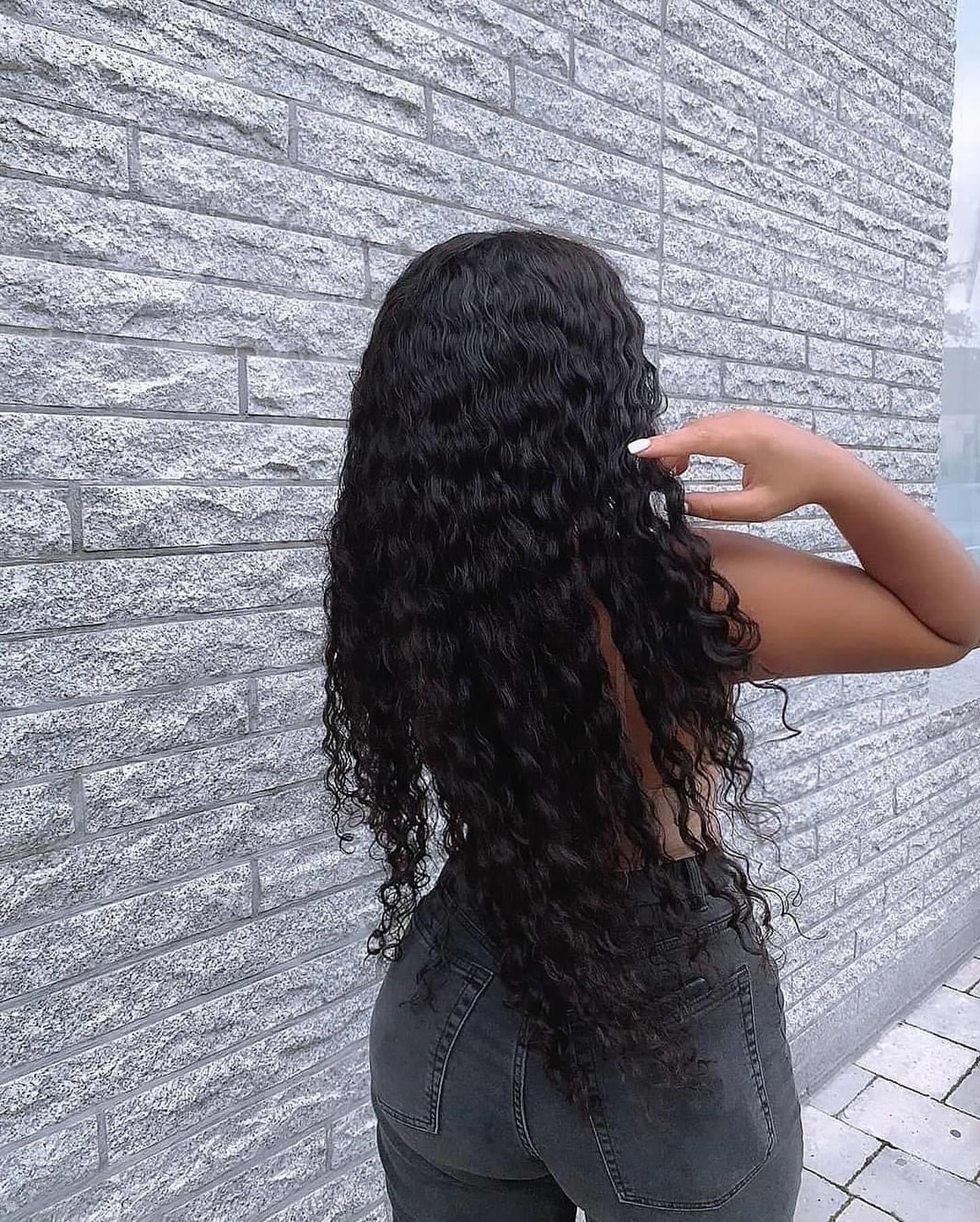 Premium hair extensions from Nikki Smith Hair Collection, showcasing various textures and styles including straight, wavy, curly, and body wave options, designed to add volume and luxury to any look.