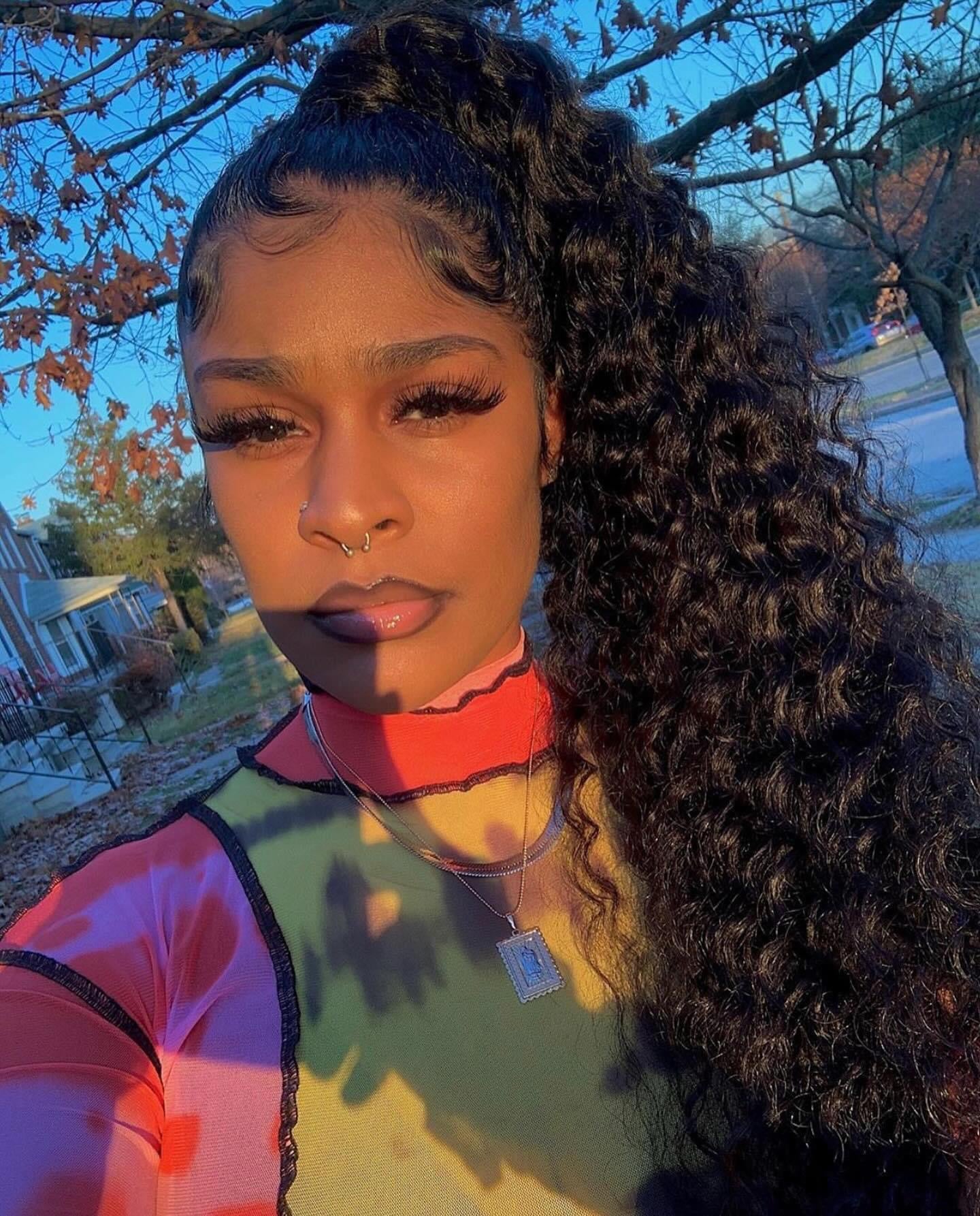 Premium hair extensions from Nikki Smith Hair Collection, showcasing various textures and styles including straight, wavy, curly, and body wave options, designed to add volume and luxury to any look.