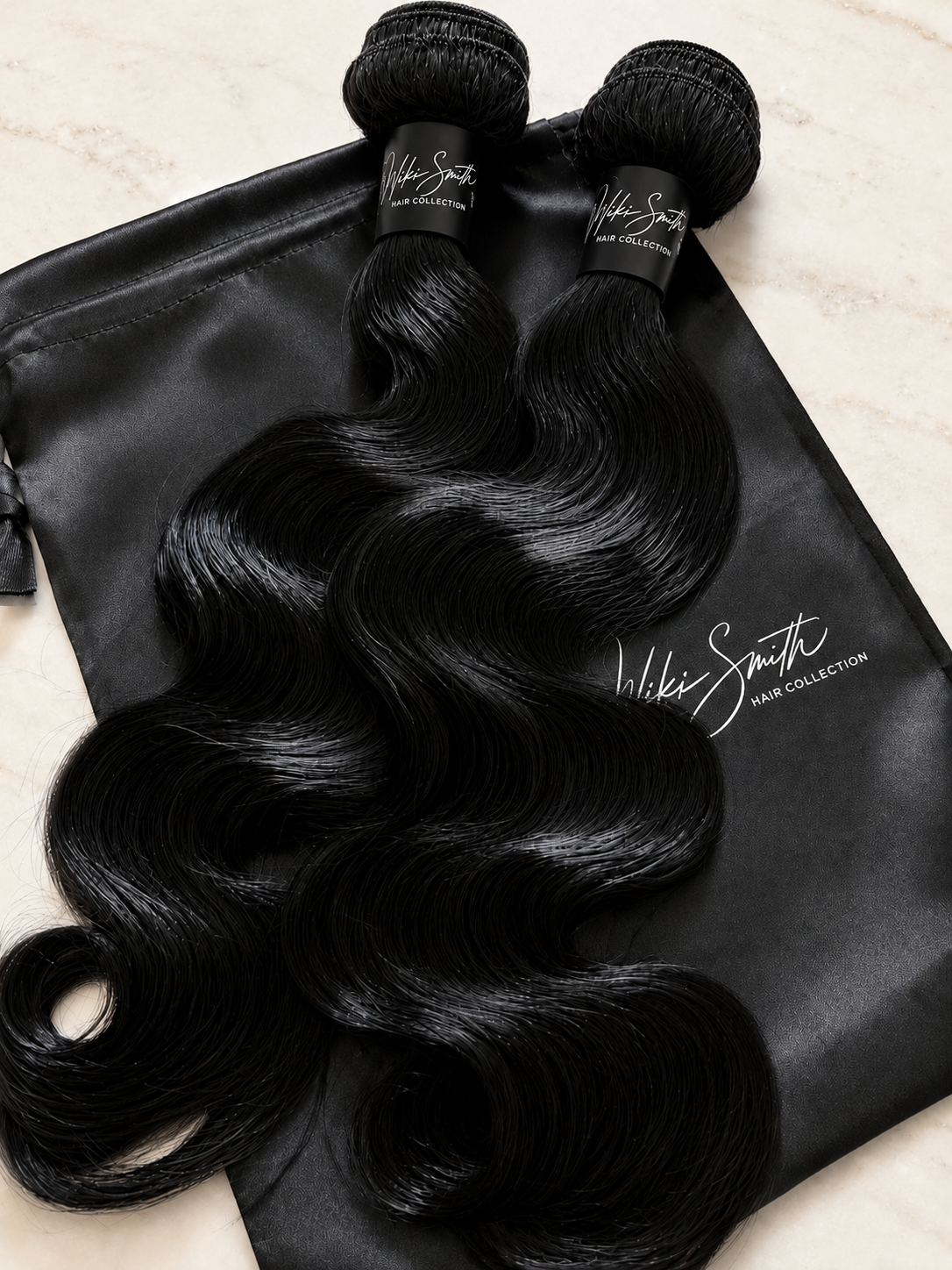 Jet black body wave human hair bundles from Nikki Smith Hair Collection
