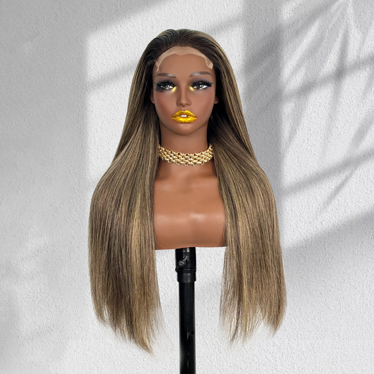 Front view of a straight balayage 5x5 HD lace wig with dark roots and blonde highlights on a mannequin.