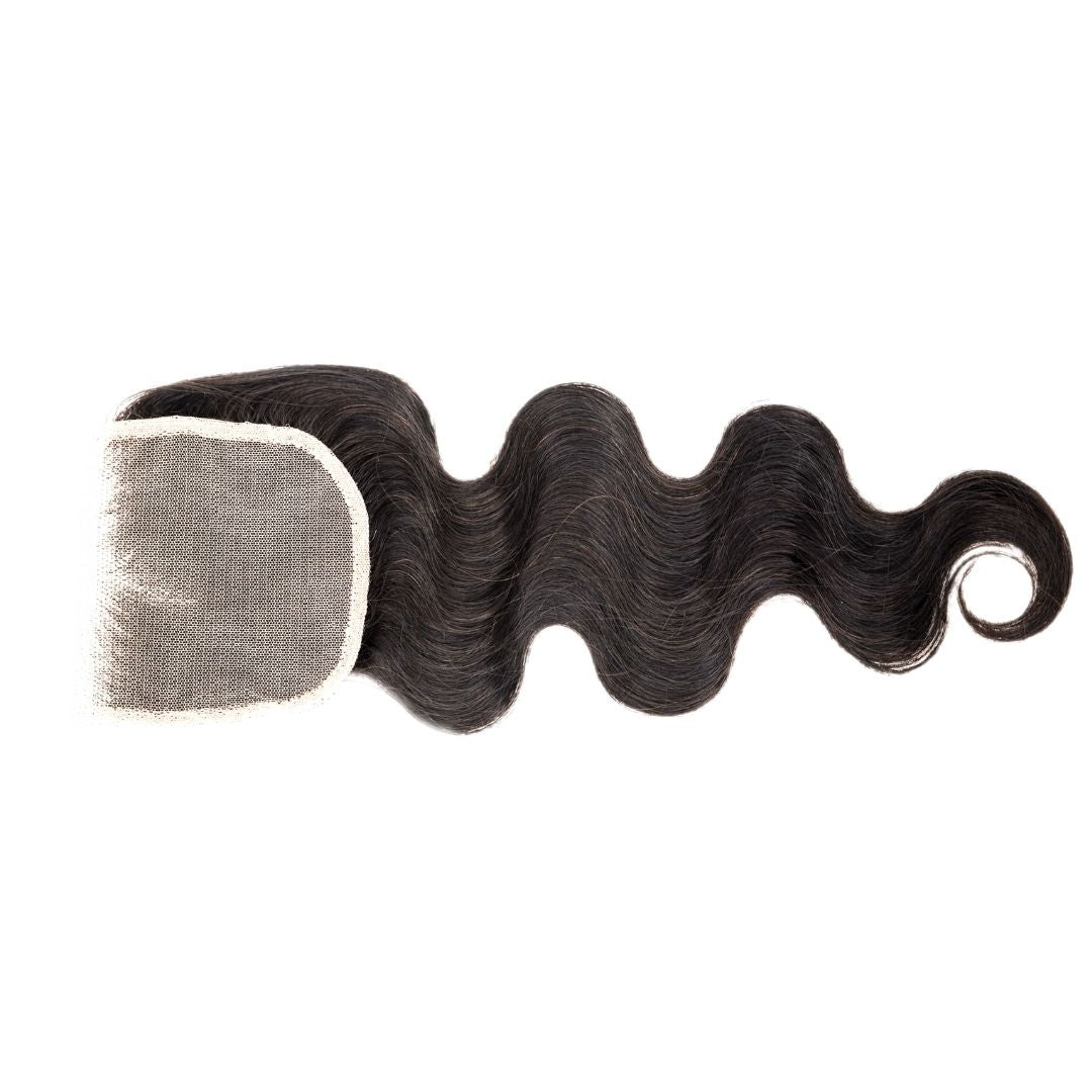 Brazilian Body Wave 4x4 Closure close-up, showing the texture of the body waves and lace closure.