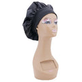 Black silk bonnet for overnight hair protection from Nikki Smith Hair Collection