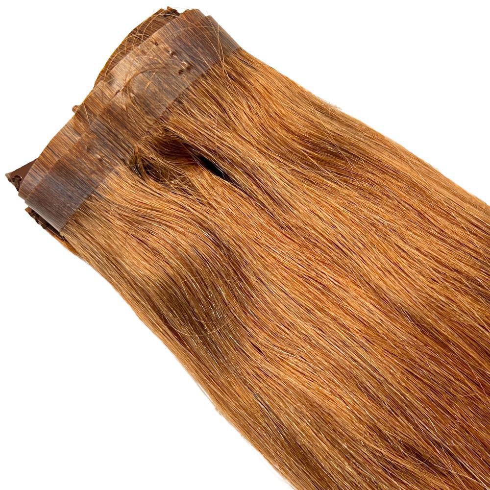 Auburn Seamless Clip-In from Nikki Smith Hair Collection, featuring high-quality 100% Remy human hair for natural volume and seamless blending.