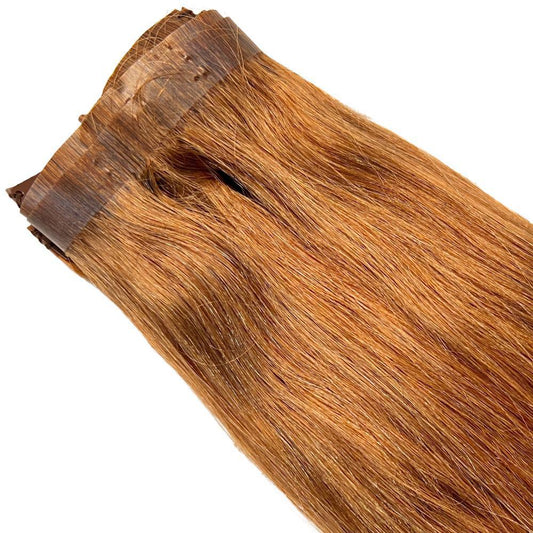 Auburn Seamless Clip-In from Nikki Smith Hair Collection, featuring high-quality 100% Remy human hair for natural volume and seamless blending.