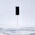 Luxurious lip product from Nikki Smith Hair Collection, offering a smooth, non-sticky formula that provides long-lasting shine and hydration while enhancing your lips with a variety of beautiful shades