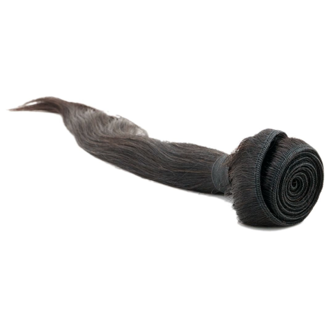 Nikki Smith Hair Collection's Malaysian Straight Bundles, showing the full length and sleek look of the hair extensions. Perfect for smooth hairstyles.