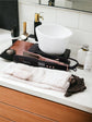 Black and pink Nikki Smith titanium flat iron with wide plates