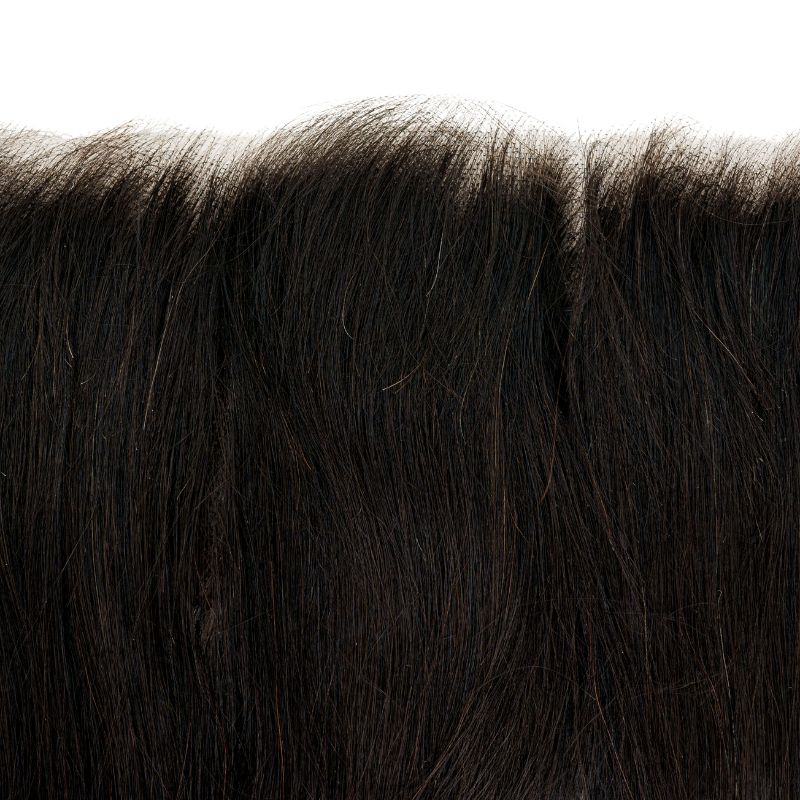 Image focusing on the straight hair texture and HD lace of the Brazilian Straight Frontal.