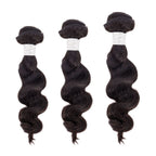 Premium hair extensions from Nikki Smith Hair Collection, showcasing various textures and styles including straight, wavy, curly, and body wave options, designed to add volume and luxury to any look.