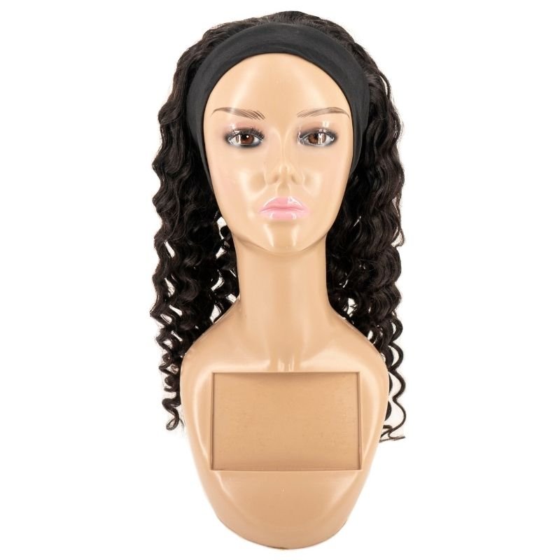 Deep Wave Headband Wig from Nikki Smith Hair Collection, made with 100% human hair in natural 1B color. This wig features 150% density and is adjustable to fit size 22.5 (Medium). It offers a comfortable, secure fit and can be lifted to a #27 color.