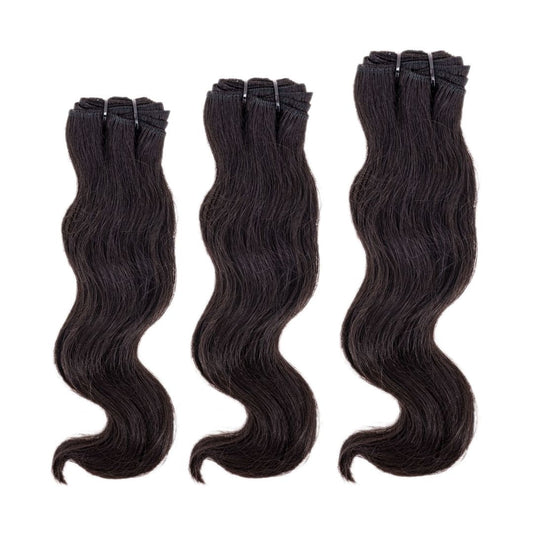 Raw Wavy Indian Hair Bundle Deal from Nikki Smith Hair Collection. 100% human hair weave in natural 12A wavy texture, available in lengths from 10” to 28”. Machine double stitch wefts for durability, with a raw grade for high-quality hair. Can lift to #613, sourced from temples in South East India.