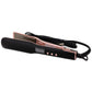 Side view of the Nikki Smith Titanium Flat Iron showing its sleek, modern design with black and pink coloring.