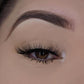 3D lashes from Nikki Smith Hair Collection, offering voluminous, fluttery lashes with a natural, layered look for a dramatic yet elegant eye enhancement.