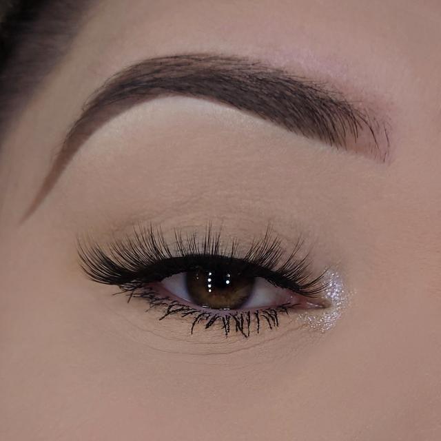 3D lashes from Nikki Smith Hair Collection, offering voluminous, fluttery lashes with a natural, layered look for a dramatic yet elegant eye enhancement.