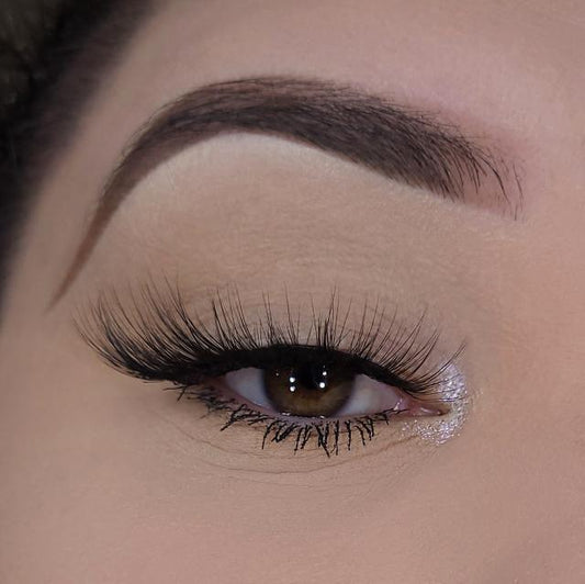 3D lashes from Nikki Smith Hair Collection, offering voluminous, fluttery lashes with a natural, layered look for a dramatic yet elegant eye enhancement.