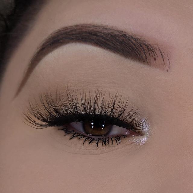 3D lashes from Nikki Smith Hair Collection, offering voluminous, fluttery lashes with a natural, layered look for a dramatic yet elegant eye enhancement.