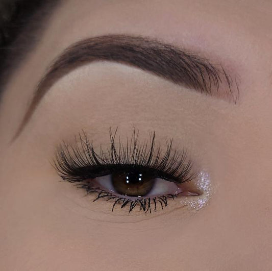 3D lashes from Nikki Smith Hair Collection, offering voluminous, fluttery lashes with a natural, layered look for a dramatic yet elegant eye enhancement.