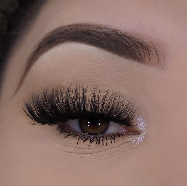 3D lashes from Nikki Smith Hair Collection, offering voluminous, fluttery lashes with a natural, layered look for a dramatic yet elegant eye enhancement.