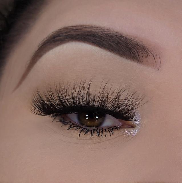 3D lashes from Nikki Smith Hair Collection, offering voluminous, fluttery lashes with a natural, layered look for a dramatic yet elegant eye enhancement.