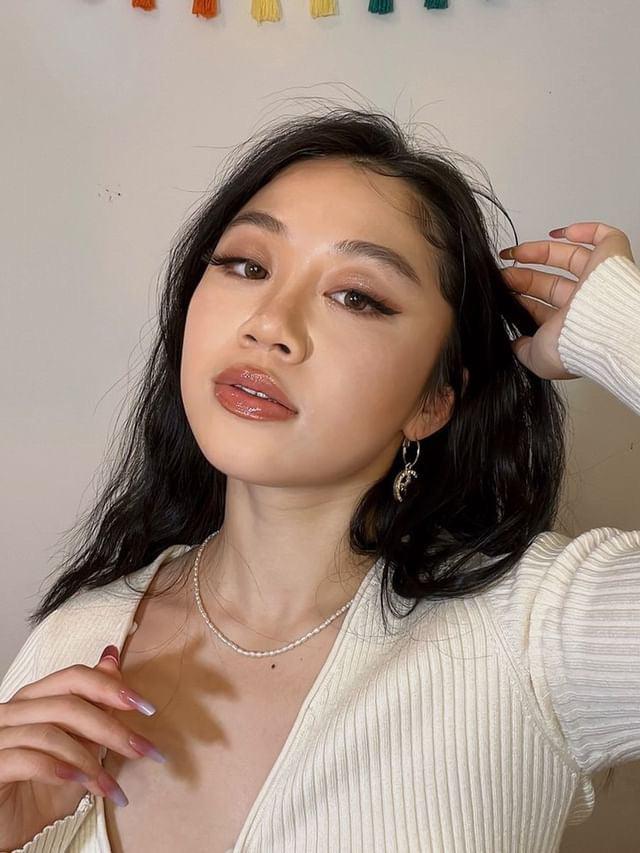 3D lashes from Nikki Smith Hair Collection, offering voluminous, fluttery lashes with a natural, layered look for a dramatic yet elegant eye enhancement.