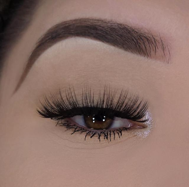 3D lashes from Nikki Smith Hair Collection, offering voluminous, fluttery lashes with a natural, layered look for a dramatic yet elegant eye enhancement.